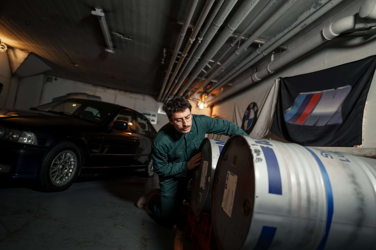 Player searching for clues near the getaway car in The Diamond Heist escape room
